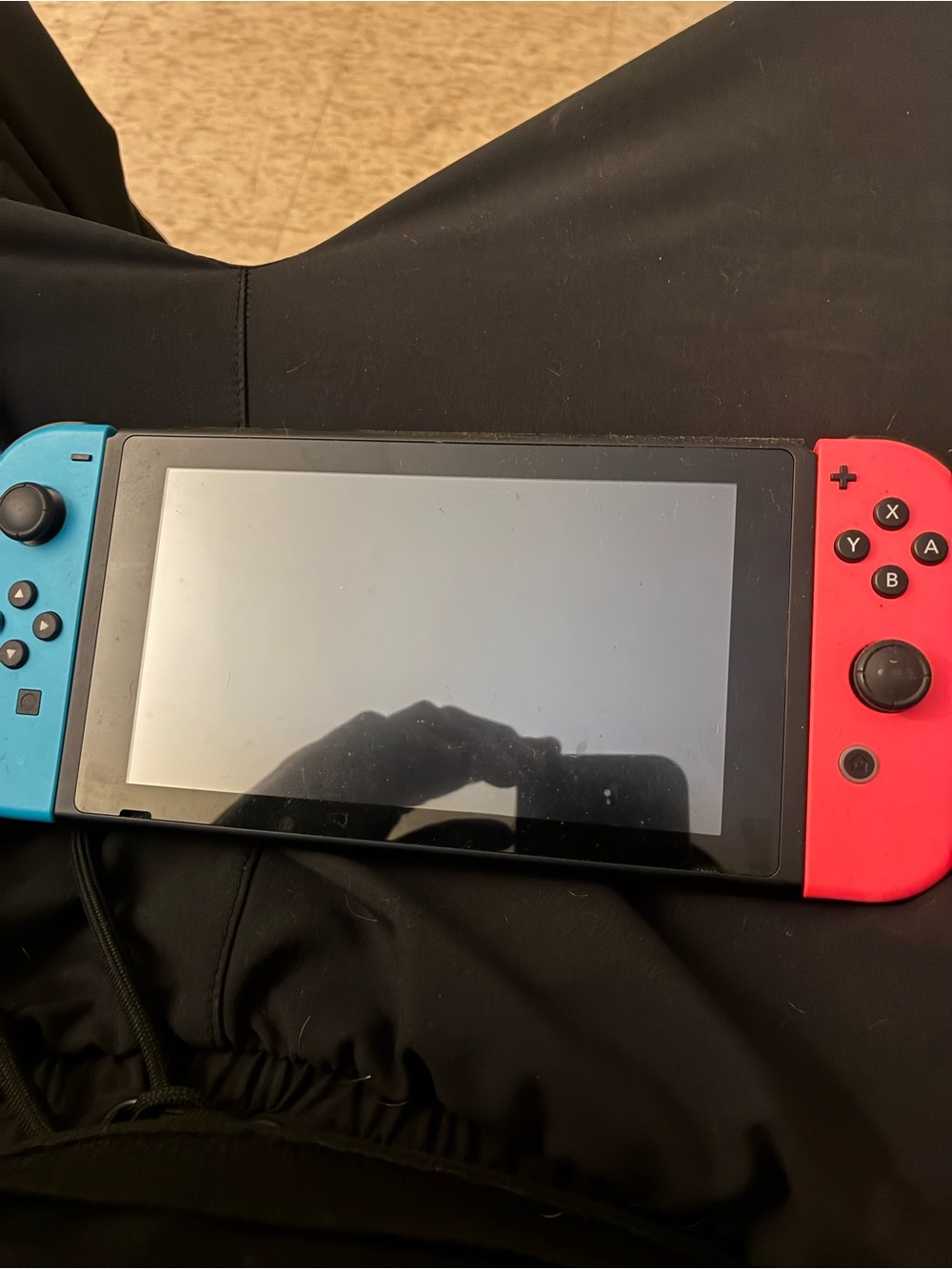 Nintendo Tablet with Neon Red and Neon Blue Joy‑Con Controllers